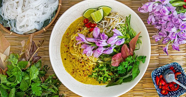 Cambodia village breakfasts feature simple but flavorful dishes like num banh chok, rice noodles with fish curry.