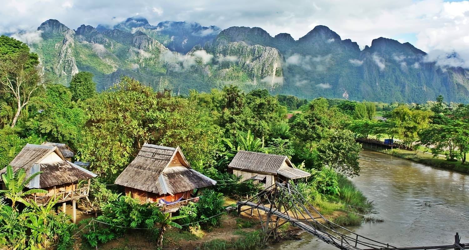Eco-lodge by the river in rural Laos — ideal for meditation, reflection, and spiritual travel in Laos.