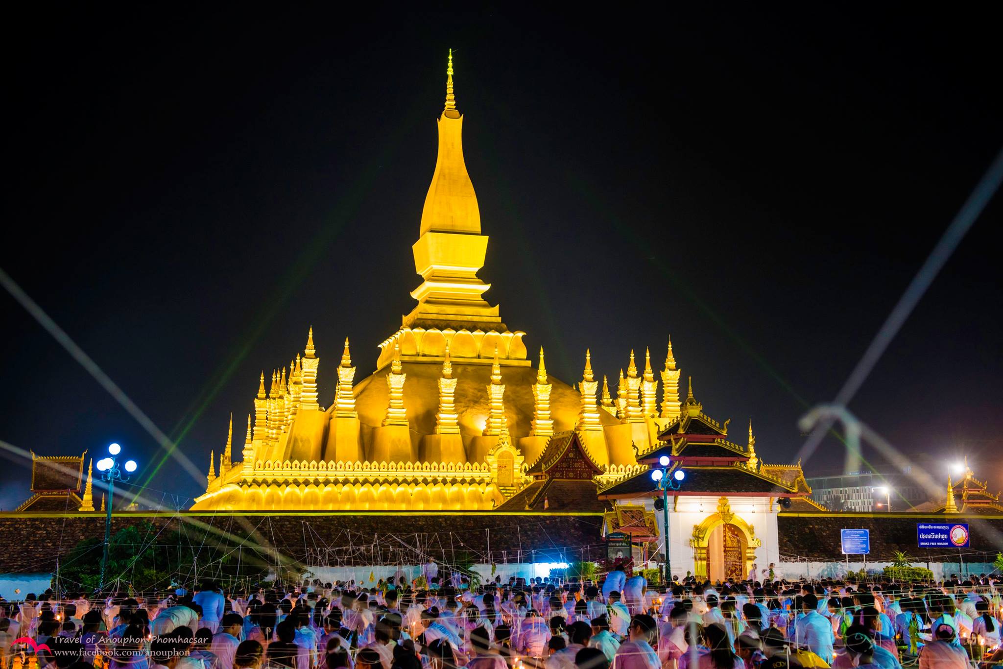 Pha That Luang glowing at night in Vientiane — a sacred symbol and top site for spiritual travel in Laos.