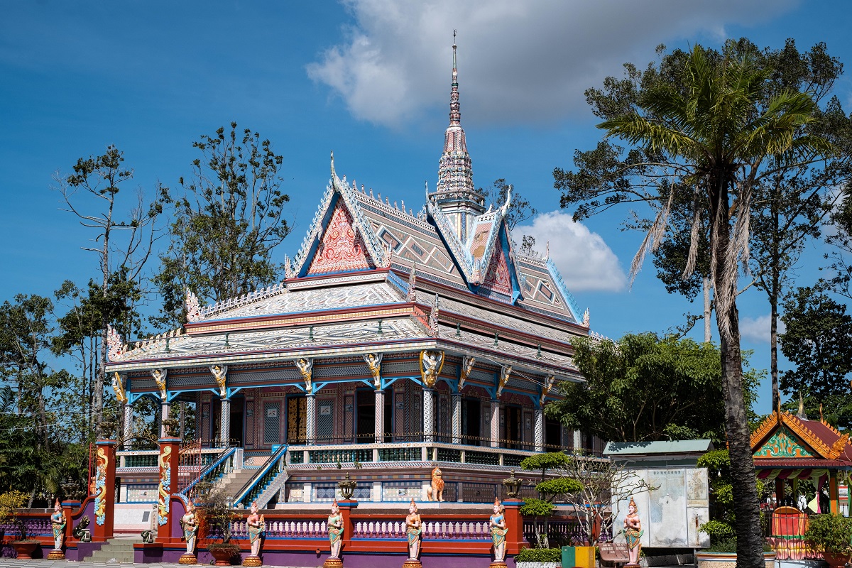 Scenic view of a rural Cambodian village with traditional pagoda