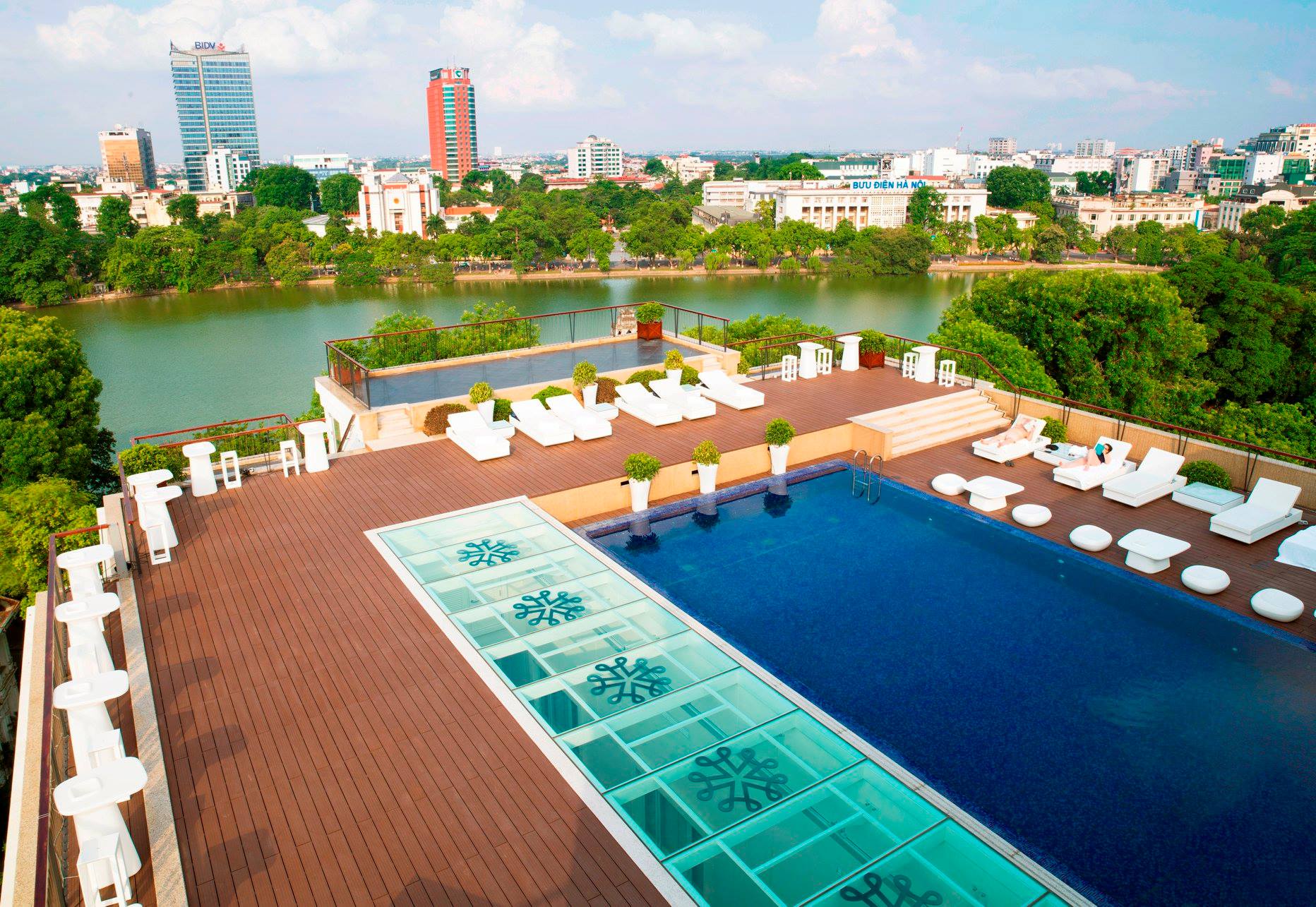 Apricot Hotel Hanoi rooftop pool with panoramic views of Hoan Kiem Lake.