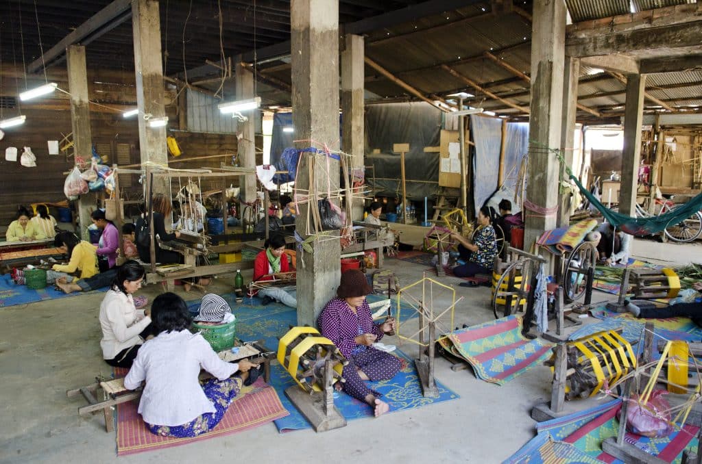 Cambodia culture tours in rural provinces - Skilled artisans hand-weaving intricate silk textiles