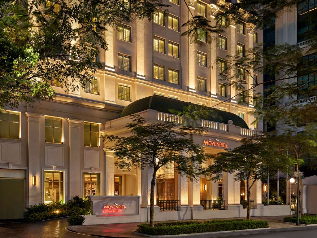Elegant exterior view of mövenpick hotel hanoi at night