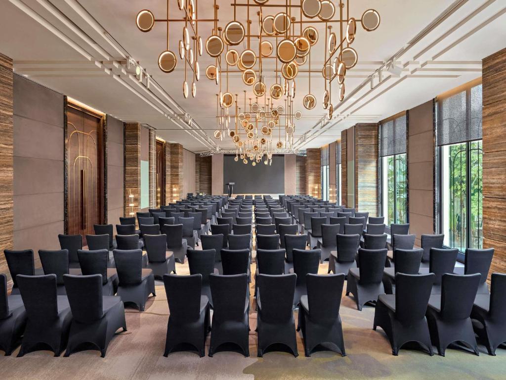 Modern conference room with stylish chandeliers at mövenpick hotel hanoi
