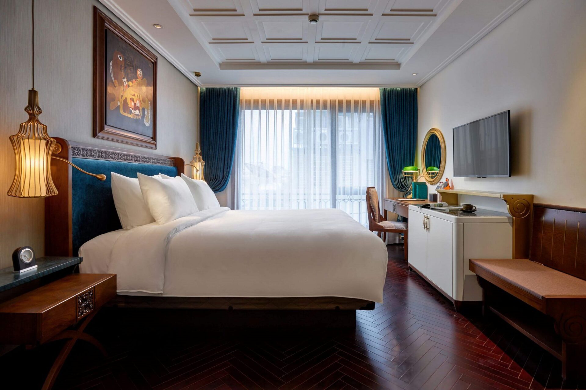 Peridot Grand Luxury Hotel - Junior Suite features floor-to-ceiling windows overlooking Hanoi’s lively streets.