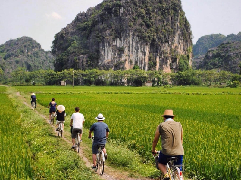 Rent a bicycle and explore the scenic backroads in Ninh Binh - Vietnam