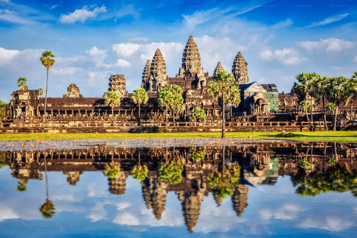 Angkor Wat temple reflected in water, a stunning stop on your Vietnam Cambodia Laos itinerary 14 days.
