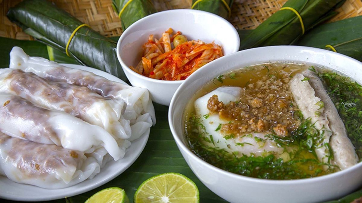 Hanoi to Saigon banh cuon: Delicate steamed rice rolls with minced pork and mushrooms, served with fish sauce