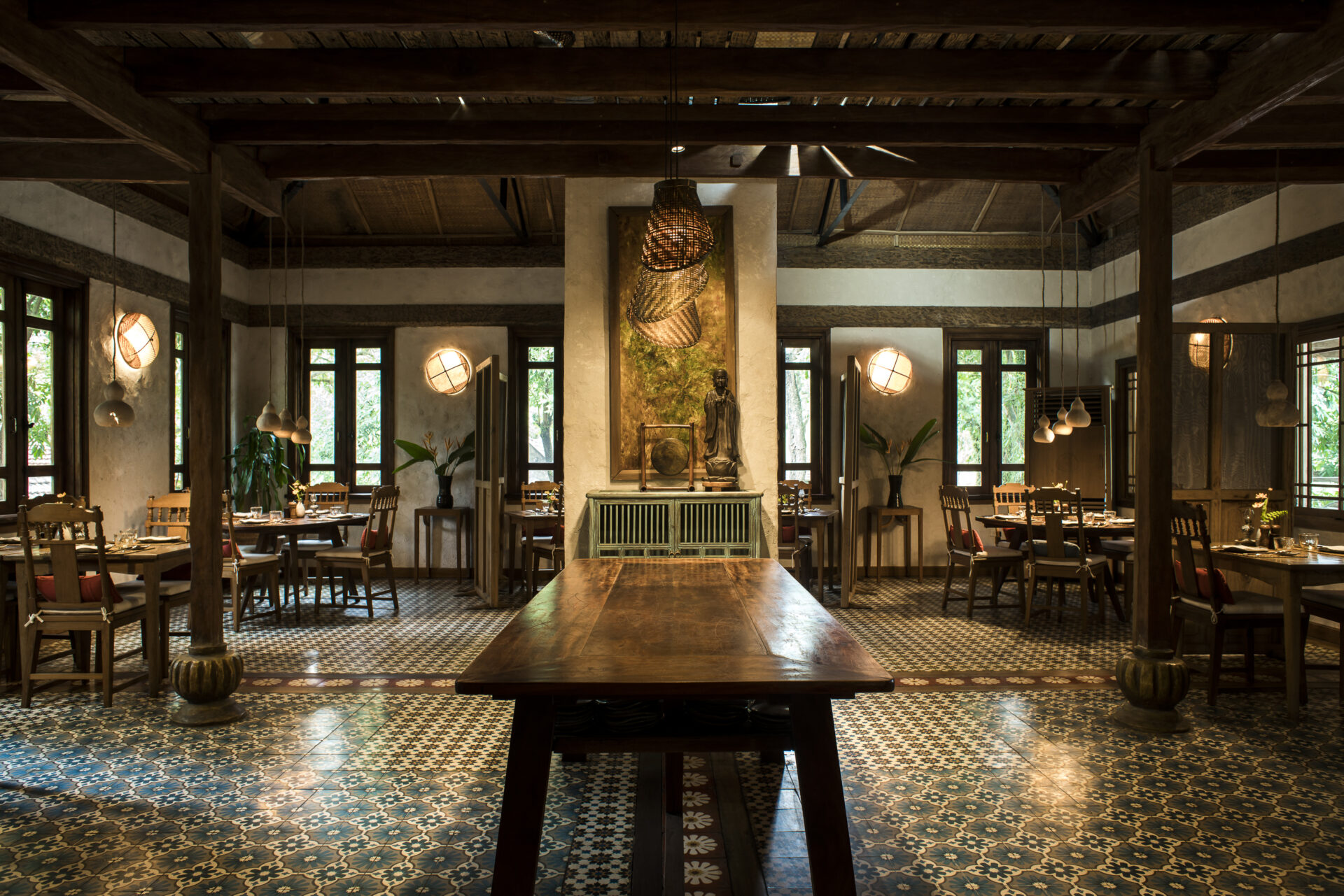 Citronella Restaurant at Tam Coc Garden Resort with traditional design, wooden furniture, tiled floor, and elegant dining ambiance.