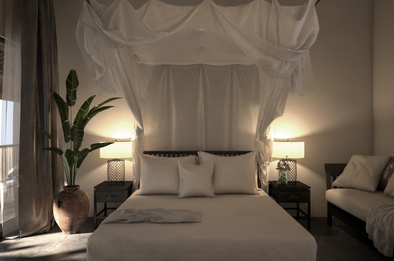 Cozy Lotus Lake Classic at Aravinda Resort Ninh Binh, featuring elegant bed setup, soft lighting, and window view of garden.