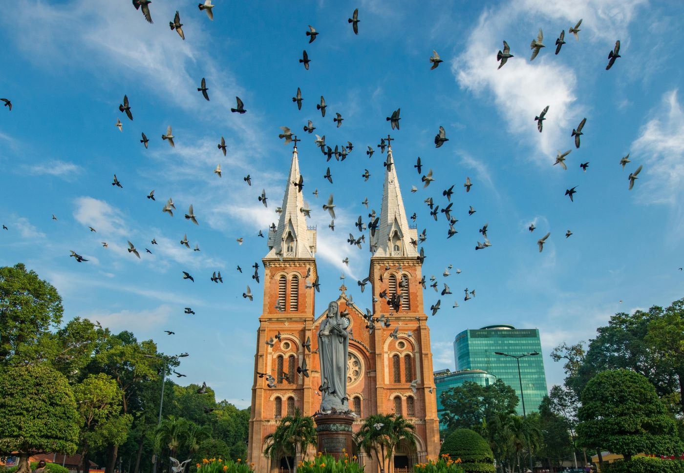 Low-angle view of the historic Notre Dame Cathedral Basilica in Ho Chi Minh City, Vietnam in August