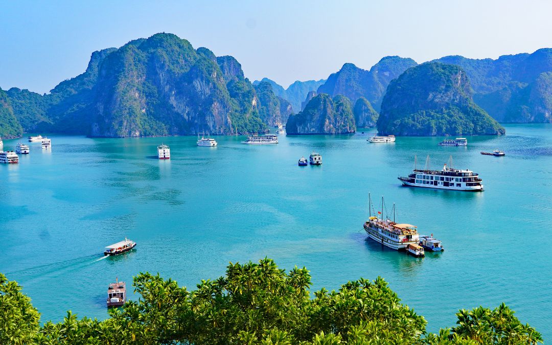 Halong Bay – emerald waters, limestone islands, and peaceful cruising under clear blue skies