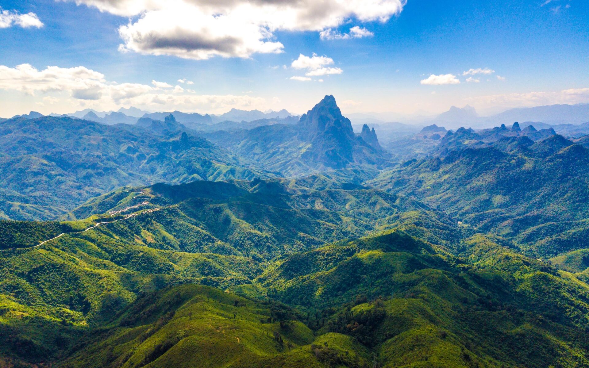 A spectacular wide-angle view of the mountainous landscape near Phou Khoun in Northern Laos