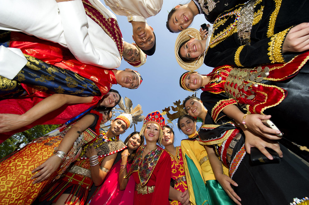 A multicultural group in Malaysia, showcasing the blend of Malay, Chinese, and Indian influences in Southeast Asia culture