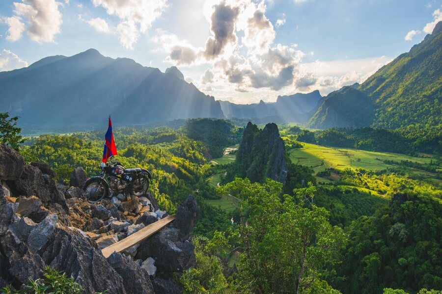 Stunning panoramic view from a rocky outcrop in Northern Laos