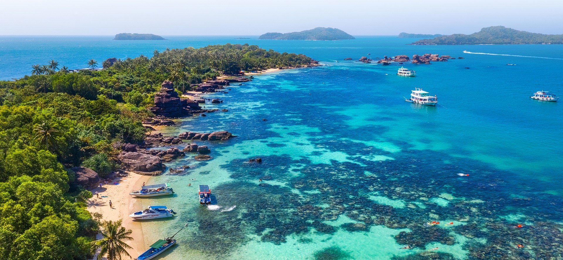 Tropical beach and bright blue ocean view Phu Quoc Island. Ideal dry season conditions in Vietnam in December