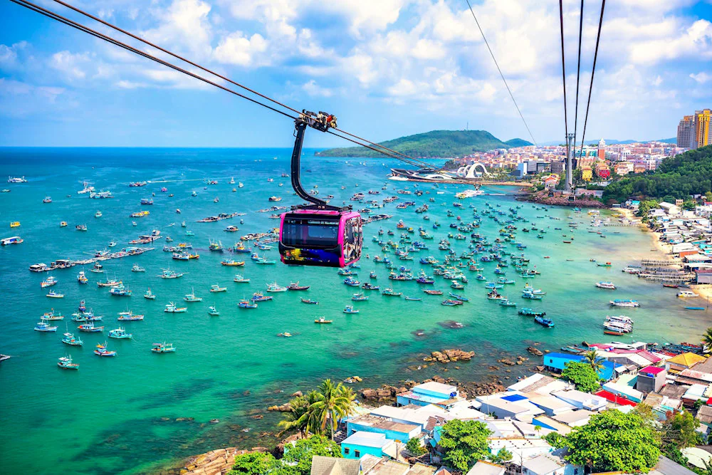 An impressive high-angle shot of the Hon Thom Cable Car, one of the famous attractions in the island coastal cities in Vietnam, Phu Quoc