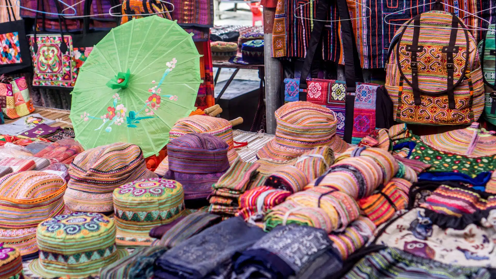 A close-up of a colorful stall at Bac Ha Market, commonly visited on a Sapa market tour