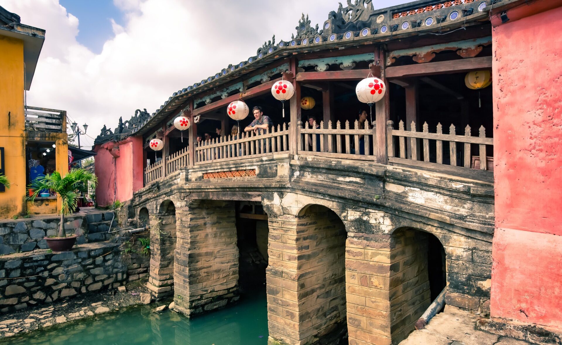 Walking Across the Iconic Japanese Covered Bridge - One of the best things to do in Hoi An