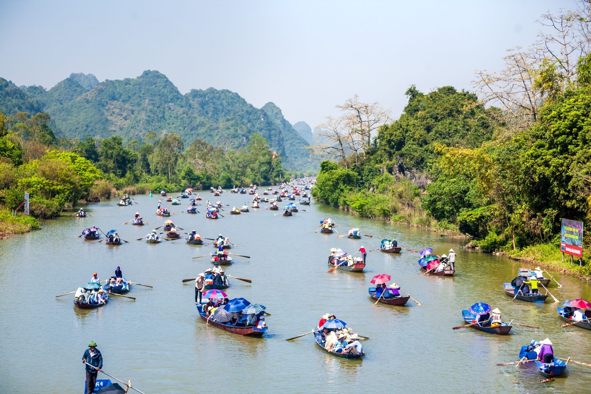 Traveling along the Yen Stream during the Perfume Pagoda Festival, one of the major Buddhist festivals in Vietnam