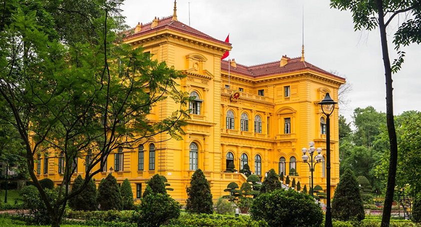 The bright yellow Presidential Palace near ba dinh square