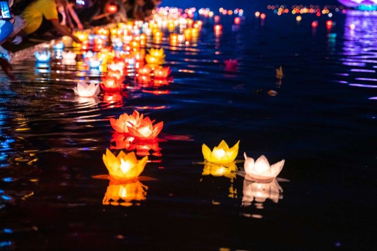 Releasing a Floating Lantern - One of the best things to do in Hoi An