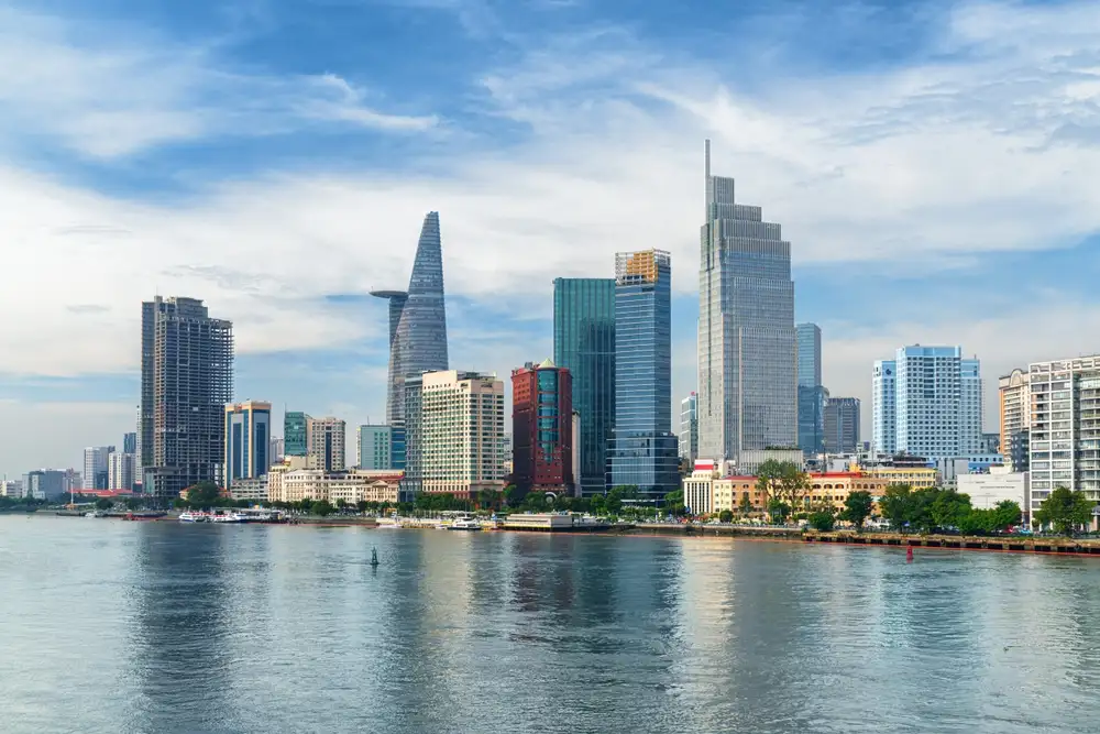 Ho Chi Minh City skyline view across the Saigon River, suggesting the best time to visit Ho Chi Minh City is during clear weather
