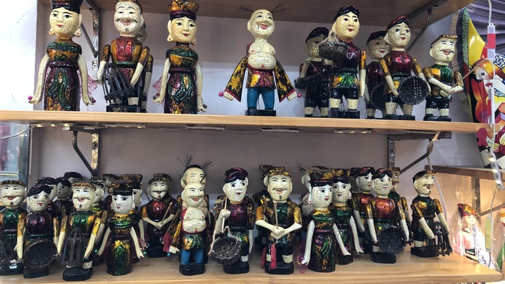 Souvenir water puppets, featuring various characters from a Hanoi water puppet show