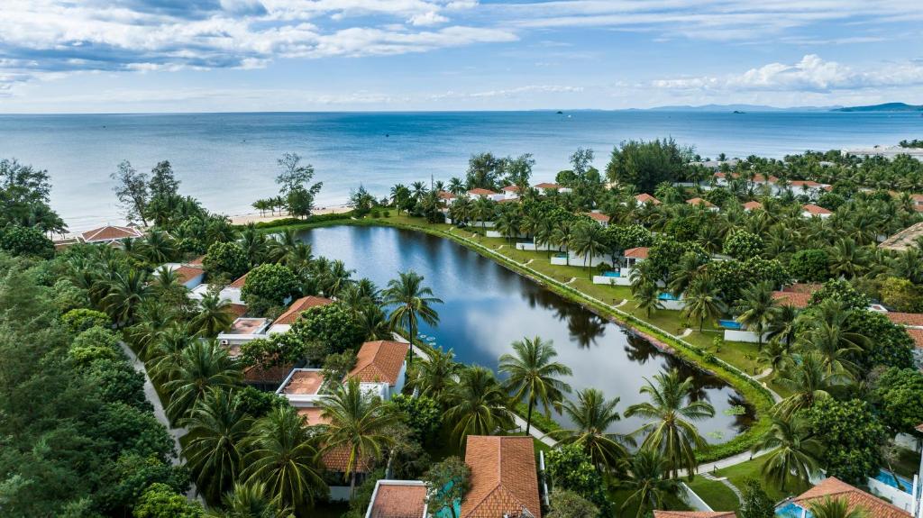 An aerial view of a luxurious resort complex, part of the Vinpearl and Premier Resorts, ideal for phu quoc island holiday packages