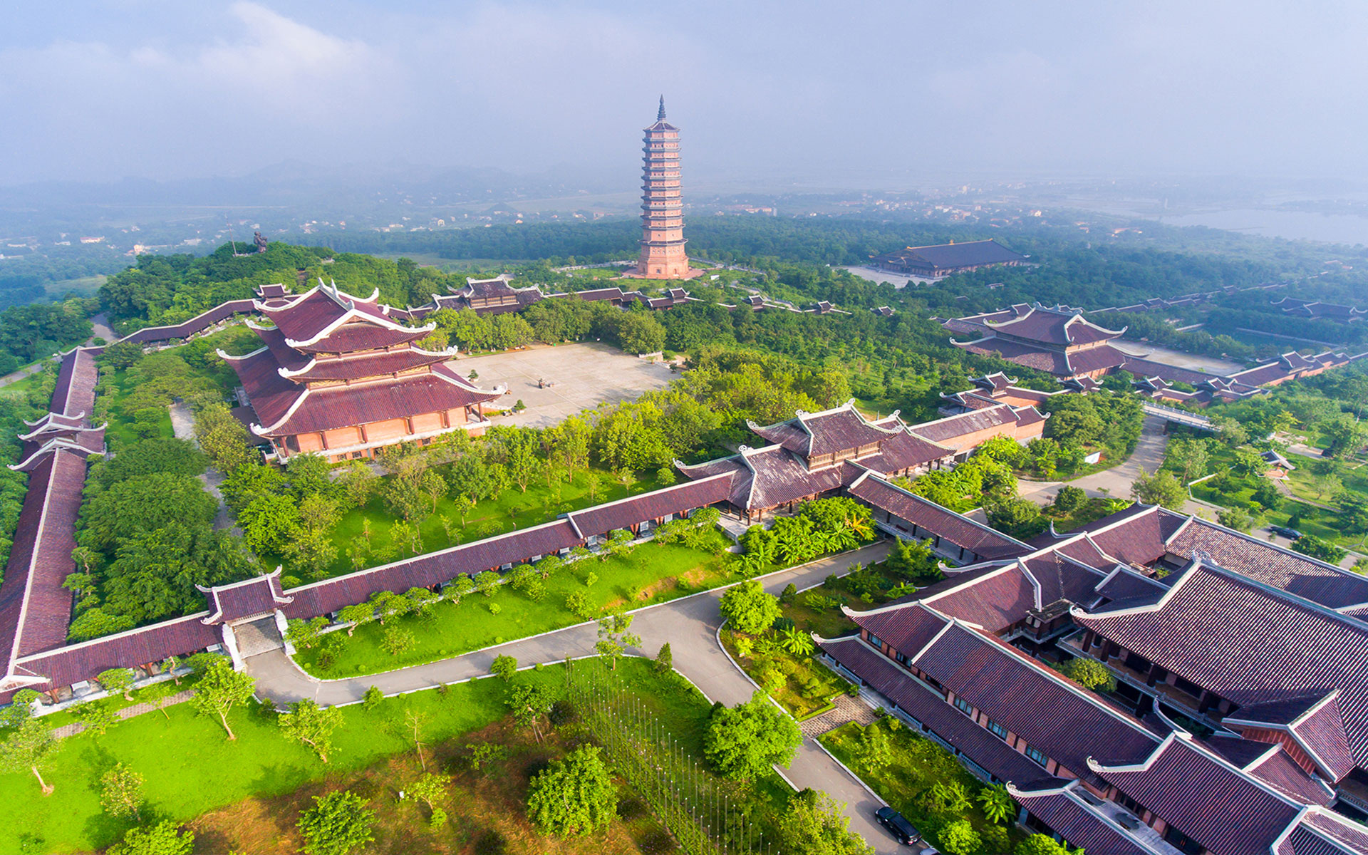 Wide aerial view of the massive Bai Dinh Pagoda complex, a significant cultural site in Ninh Binh that can be visited during the best time to visit ninh binh