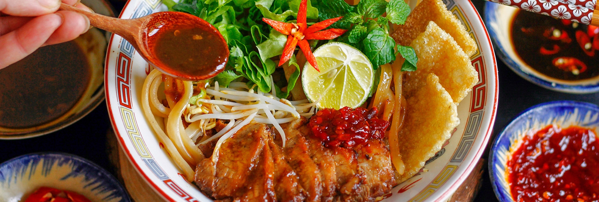 Cao Lầu, a specialty dish often taught in a cooking class hoi an