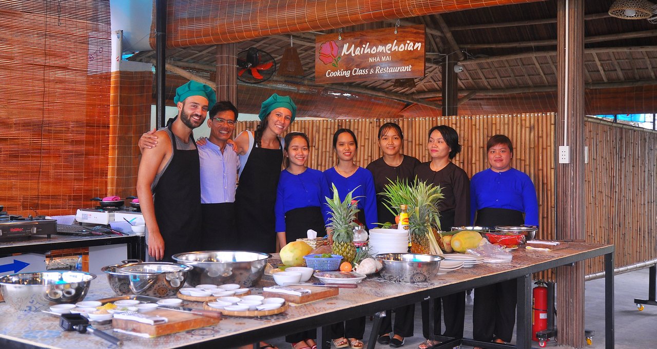 Tourists after a successful cooking class hoi an session