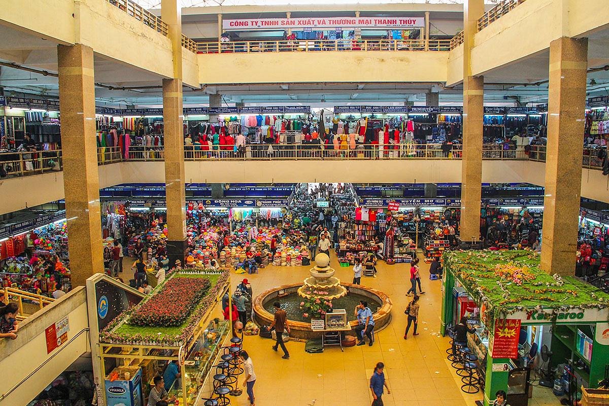 Bustling interior of Dong Xuan Market in the Hanoi Old Quarter