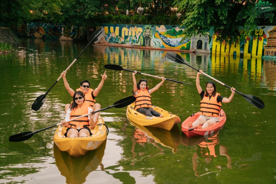 Kayaking on a river in Ninh Binh, enjoying a fun Vietnam adventure activity