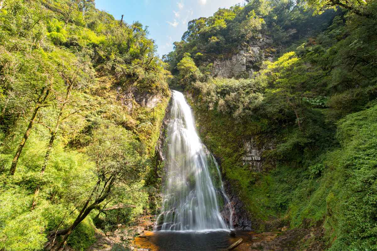 Love Waterfall, representing a beautiful spot in Sapa during the summer months, which is one of the best times to visit Vietnam Sapa