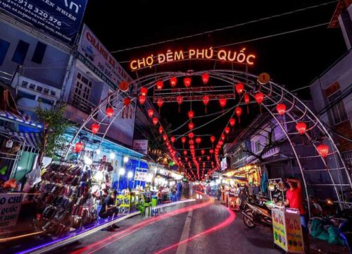 The iconic illuminated entrance arch of the Phu Quoc Night Market at night