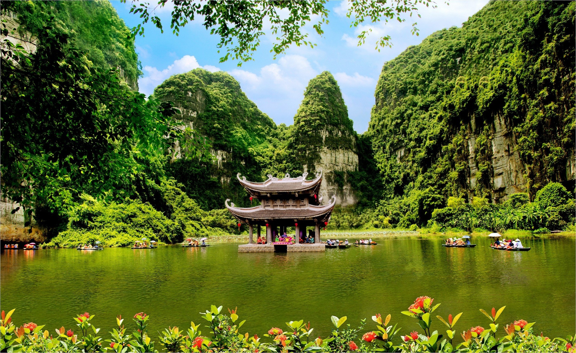 A traditional Vietnamese pagoda in Trang An, Ninh Binh, a serene view showcasing the best time to visit ninh binh
