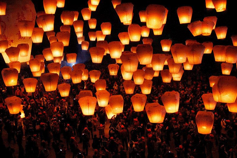 A dramatic night shot in  Vu Lan Festival or other lantern festivals in Vietnam.