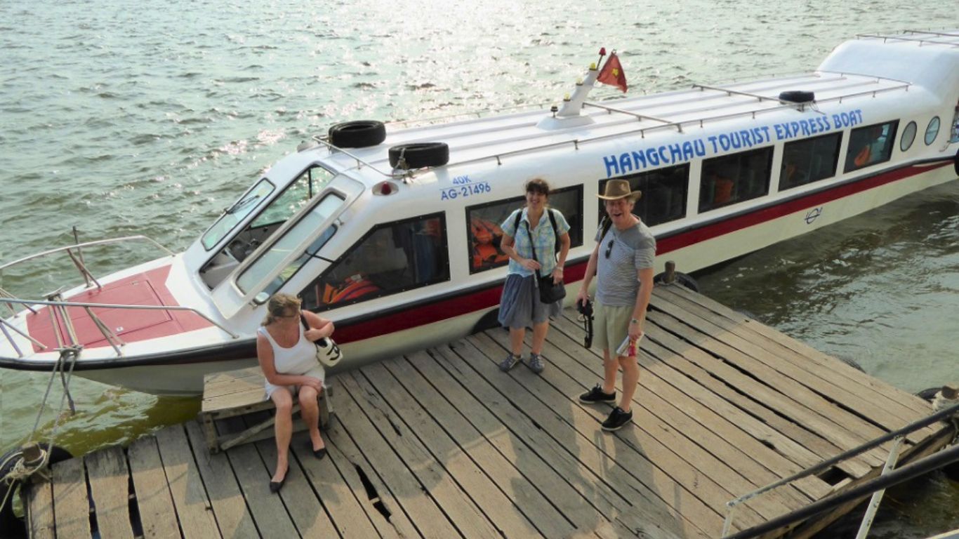 HangChau Tourist Express Boat at pier, a common speedboat service for the Chau Doc to Phnom Penh ferry route.