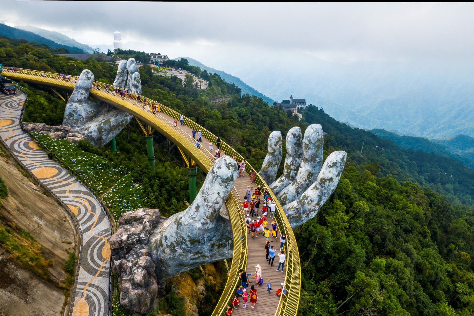Golden Bridge landmark attracts many travelers booking a scenic Danang tour package experience.