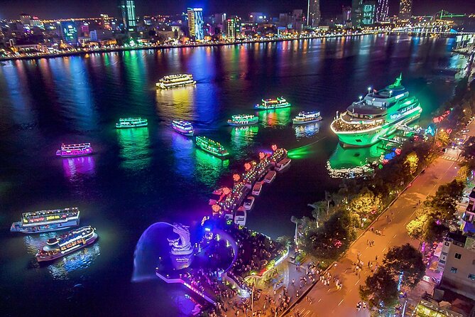 Colorful Han River cruise night view enjoyed during a vibrant Danang tour package.
