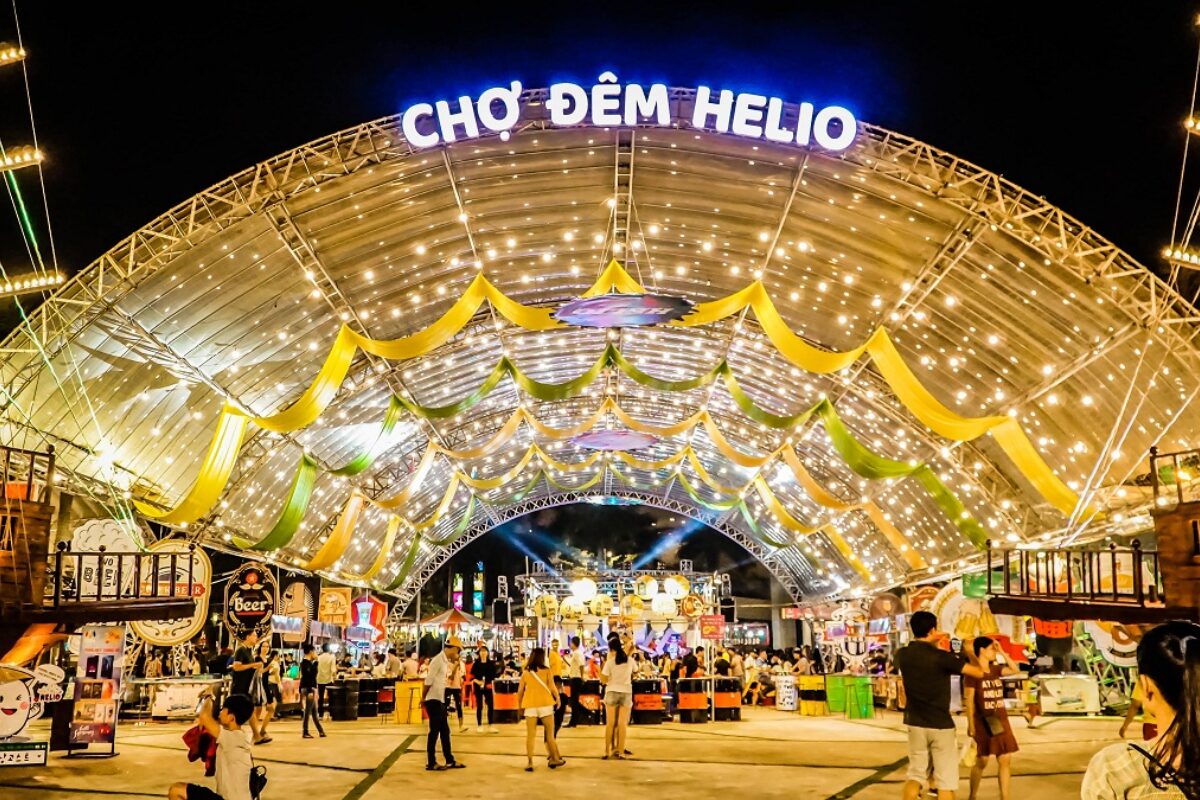 Helio Night Market Danang 2026 with bright lights and food stalls.
