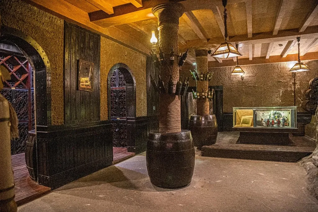 Historic Debay Wine Cellar at Ba Na Hills with wooden barrels near the iconic Golden Bridge Hoi An.
