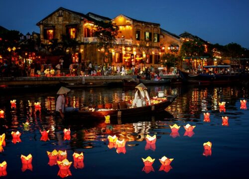 Hoi An lantern boat experience creates magical moments within a charming Danang tour package.