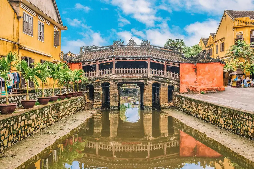 Historic Japanese Bridge in Hoi An featured in a cultural Danang tour package itinerary.