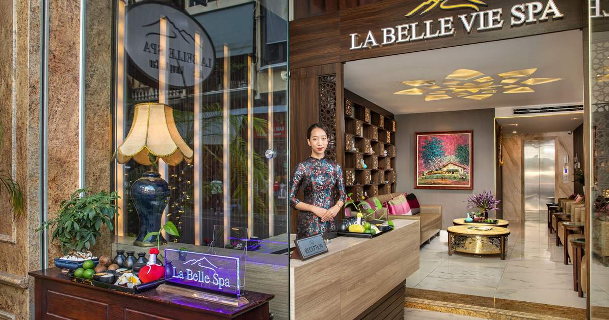Spas and Wellness Services: Interior and exterior view of the La Belle Vie Spa with a smiling receptionist and traditional decor, highlighting luxury relaxation.