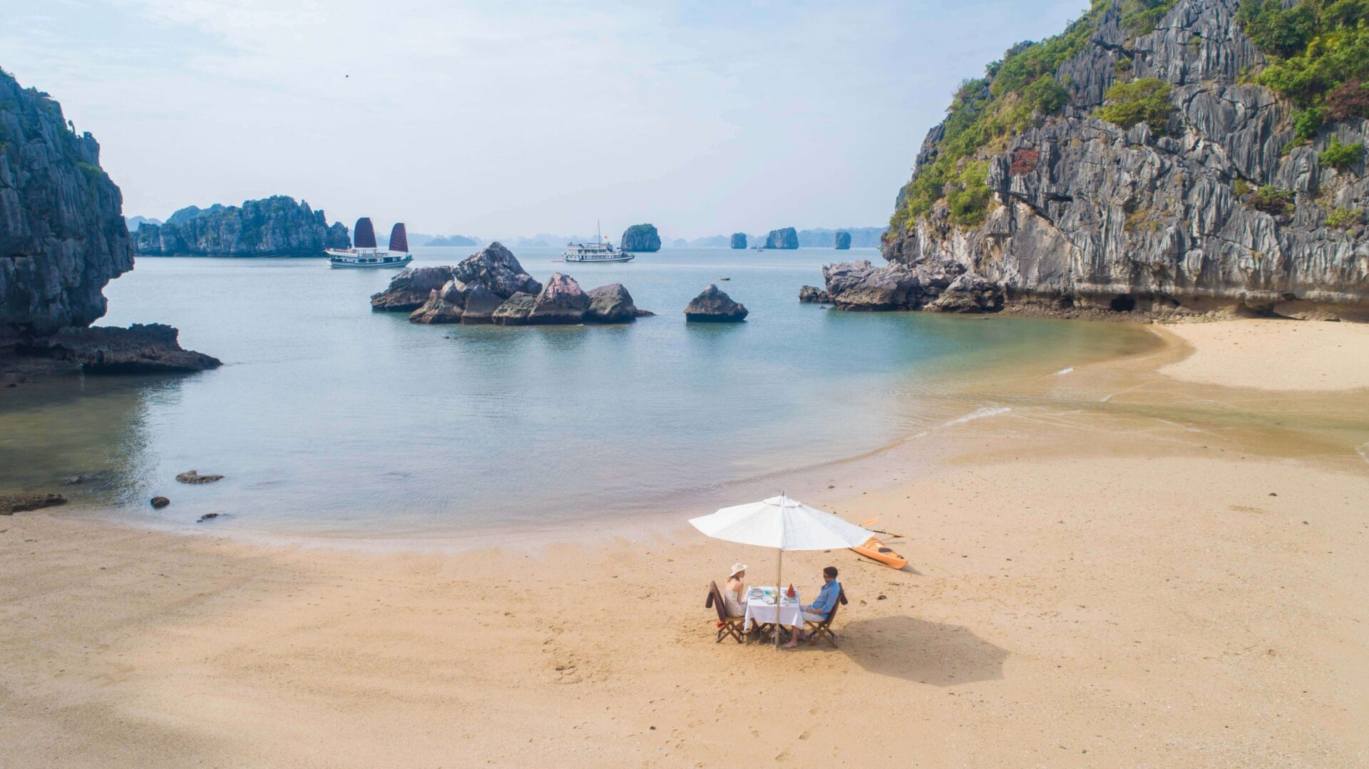 Towering karst islands in Ha Long Bay tours