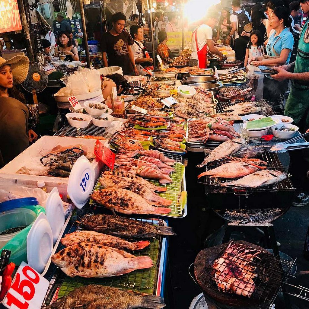 A vibrant street food stall, showcasing the savory and delicious side of chiang mai nightlife