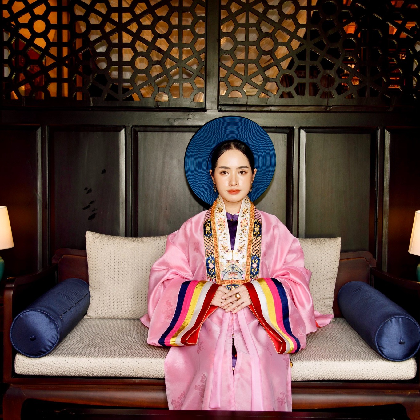 Guest dressed in traditional Vietnamese royal costume at Ancient Hue Garden Houses, reflecting Hue’s cultural heritage and timeless elegance.