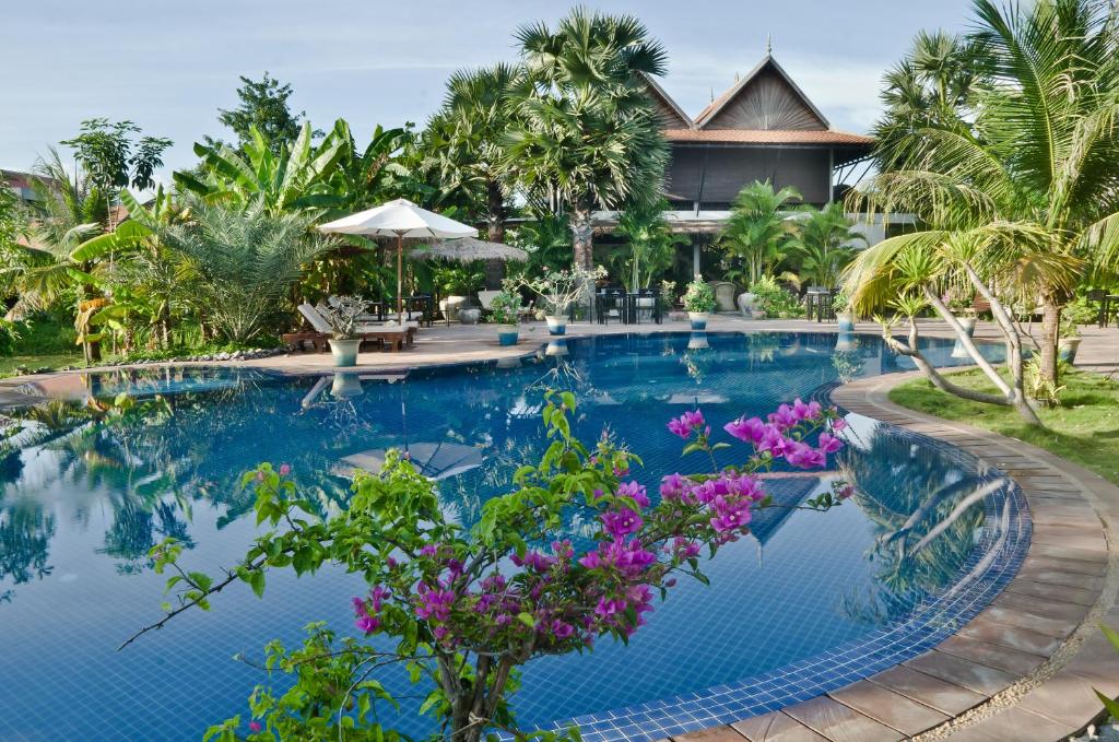 Outdoor swimming pool at Battambang Resort & Spa.